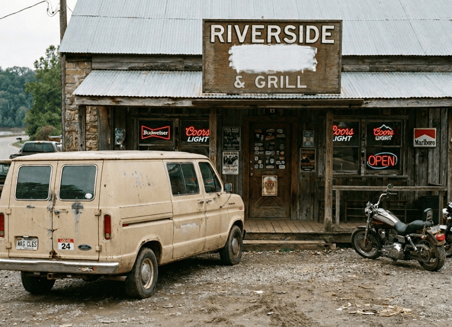 Riverside Bar and Grill storefront with motorcycles, van, and patrons
